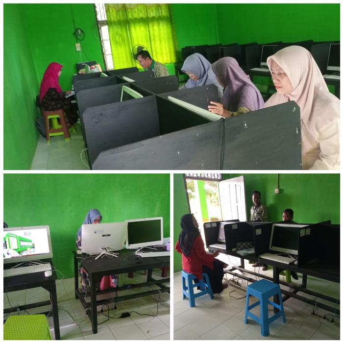 Para Wali Kelas MTs Negeri 7 Batanghari Rampungkan Pencetakan Rapor 